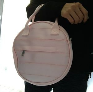 Harvey CA Pink circle handbag with crossbody strap